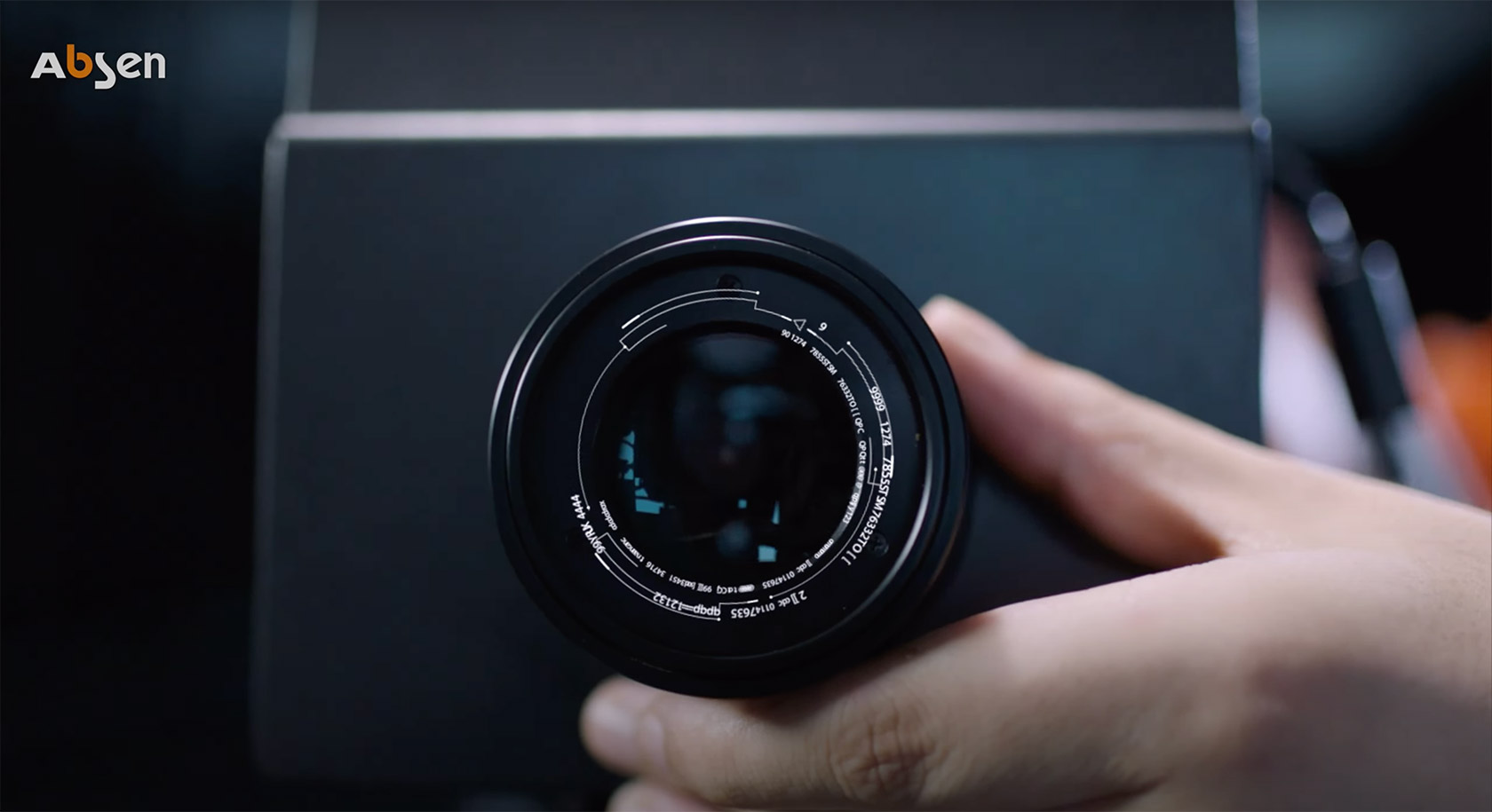 Man adjusting Absen Video Projector