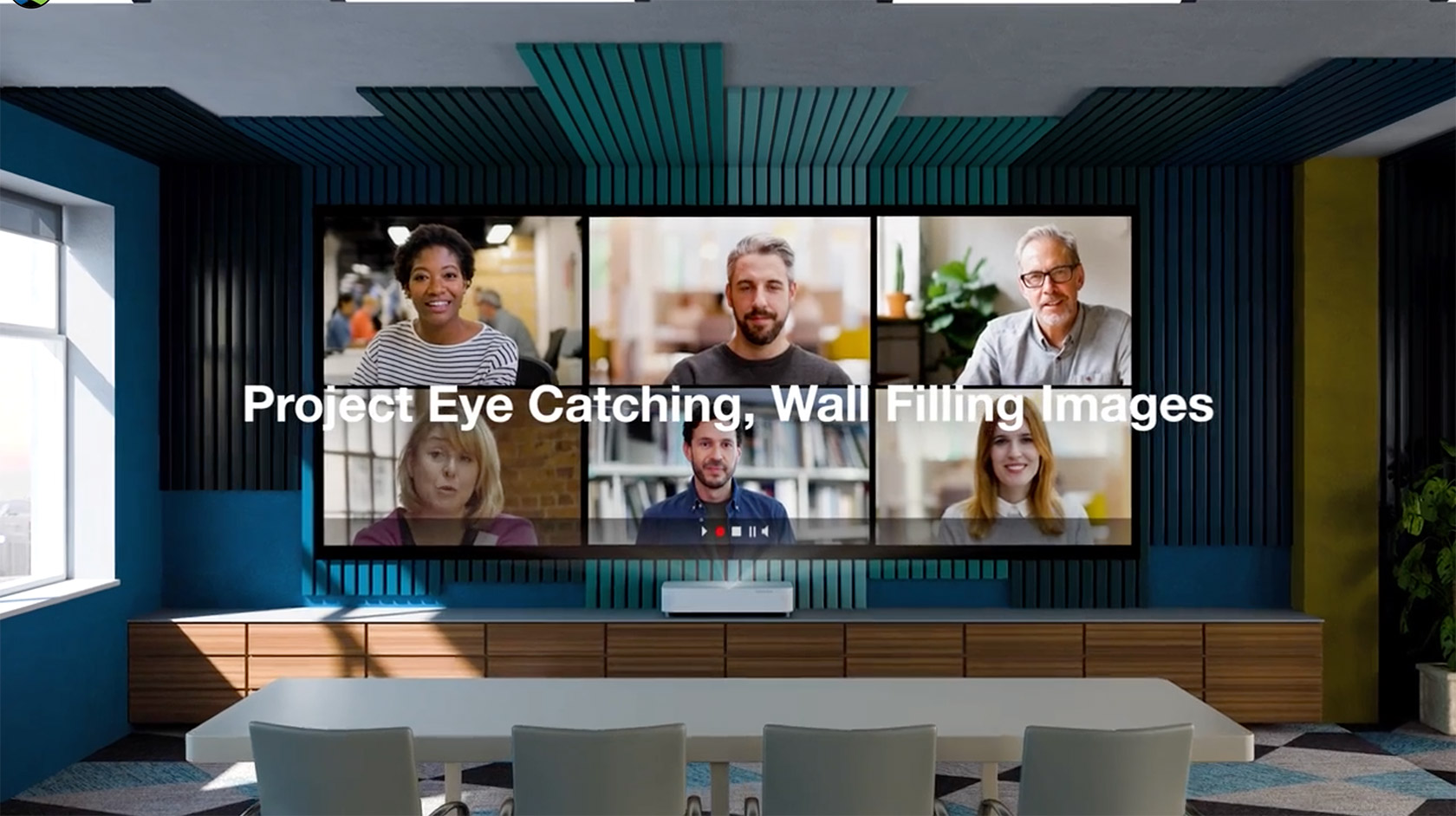 The caption: "Project Eye Catching, Wall Filling Images" on top of image of a meeting room with various people's faces on screen.