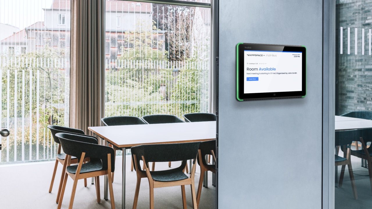 Modern conference room: rectangular table, 8 chairs, digital Room Available display, large windows with views.